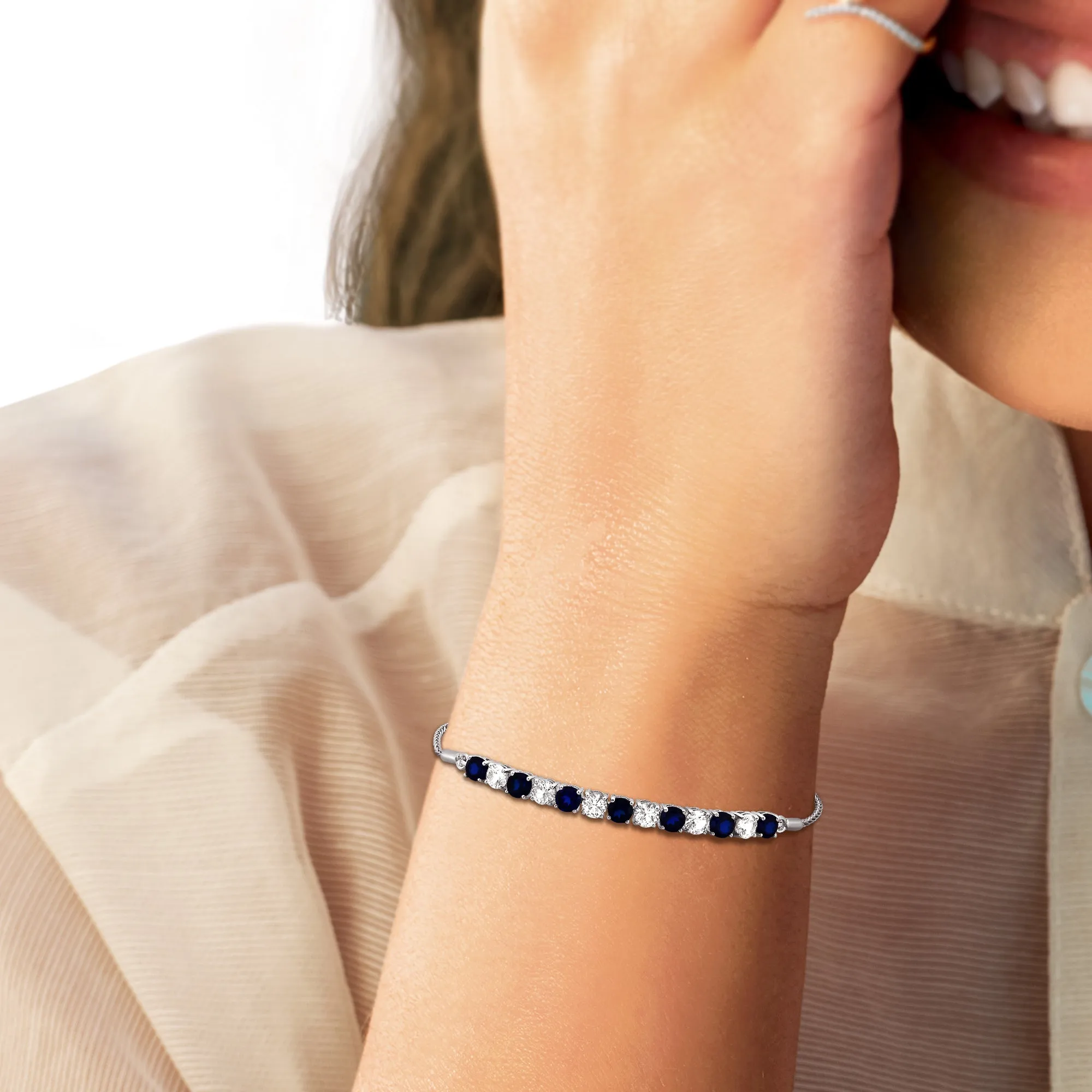 Jewelili Sterling Silver With Created Blue Sapphire and Created White Sapphire Bolo Bracelet
