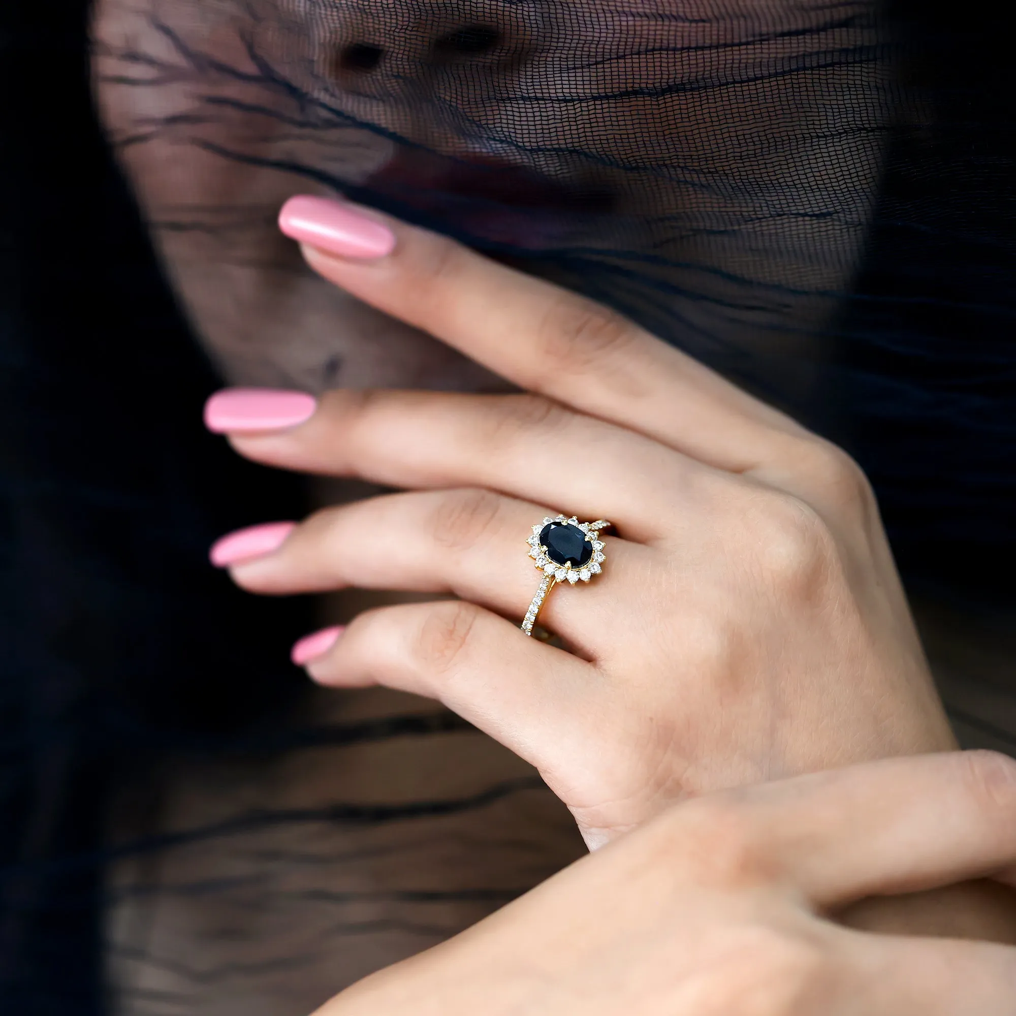 Oval Cut Lab Grown Black Diamond and Diamond Halo Engagement Ring