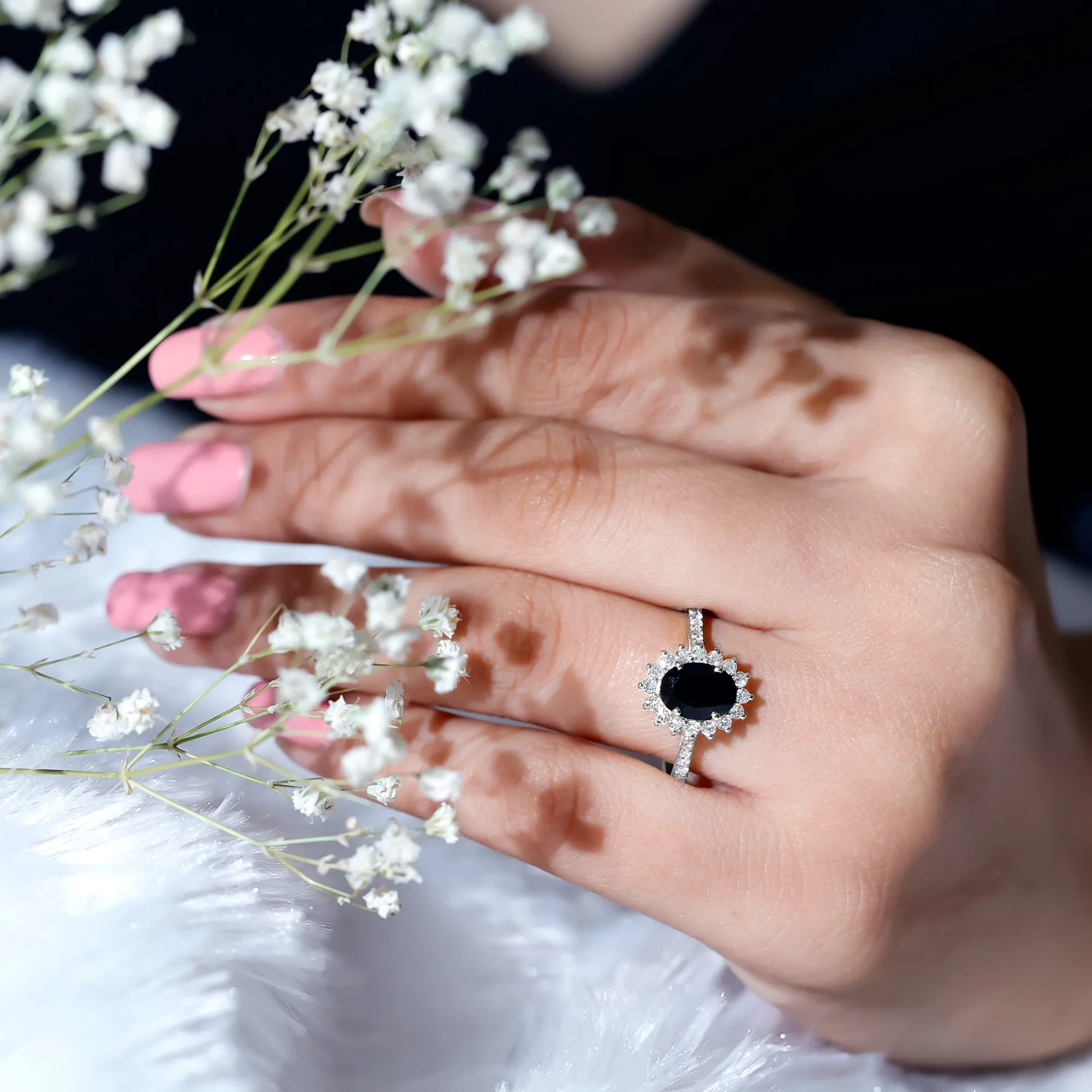 Oval Cut Lab Grown Black Diamond and Diamond Halo Engagement Ring