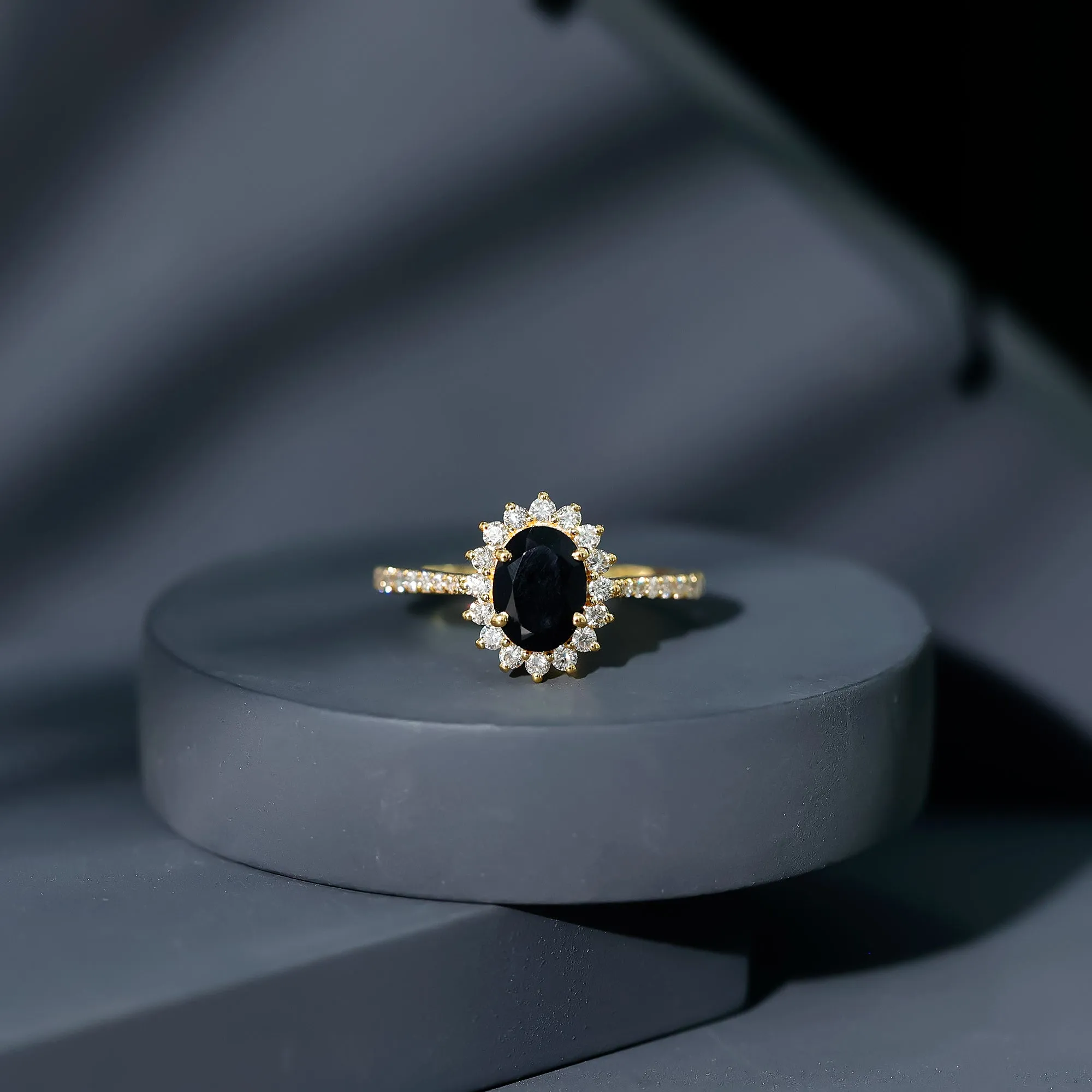 Oval Cut Lab Grown Black Diamond and Diamond Halo Engagement Ring