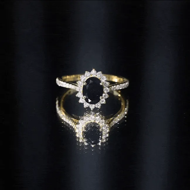 Oval Cut Lab Grown Black Diamond and Diamond Halo Engagement Ring