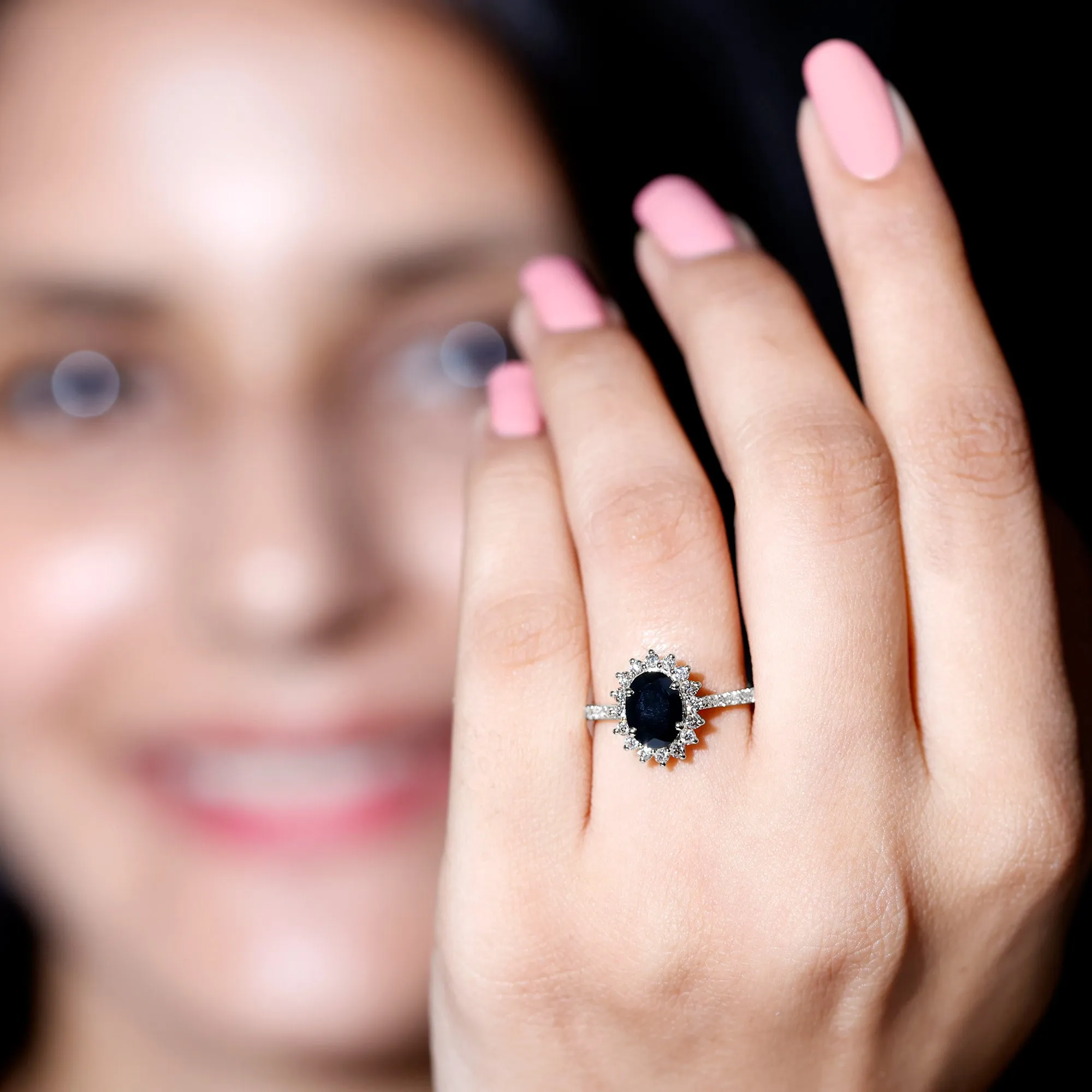 Oval Cut Lab Grown Black Diamond and Diamond Halo Engagement Ring